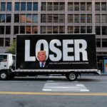 Truck with Trump loser sign